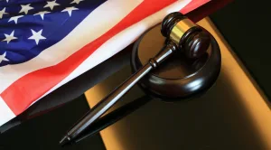 gavel-and-flag-background-scaled